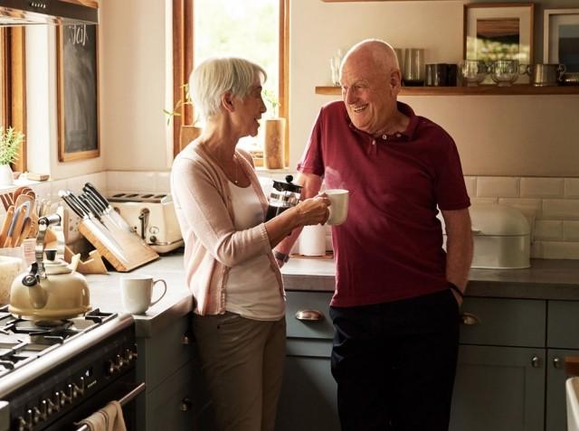 Retired couple drinking coffee